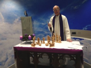 Blessing the new Nativity crib figurines